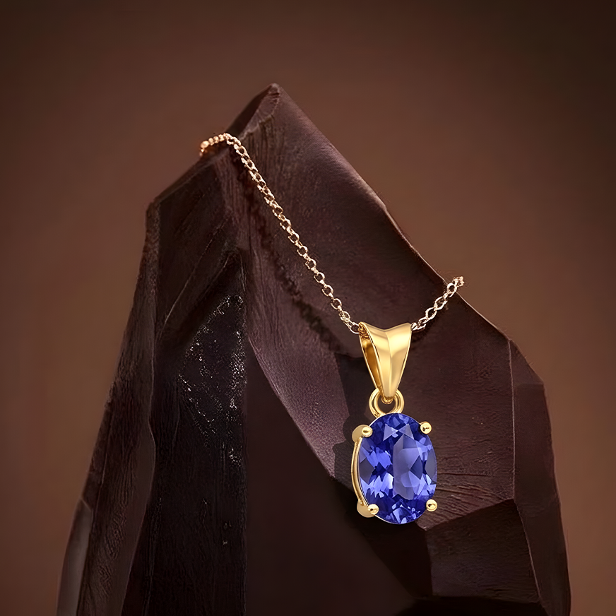 Blue sapphire stud earrings with diamond halo